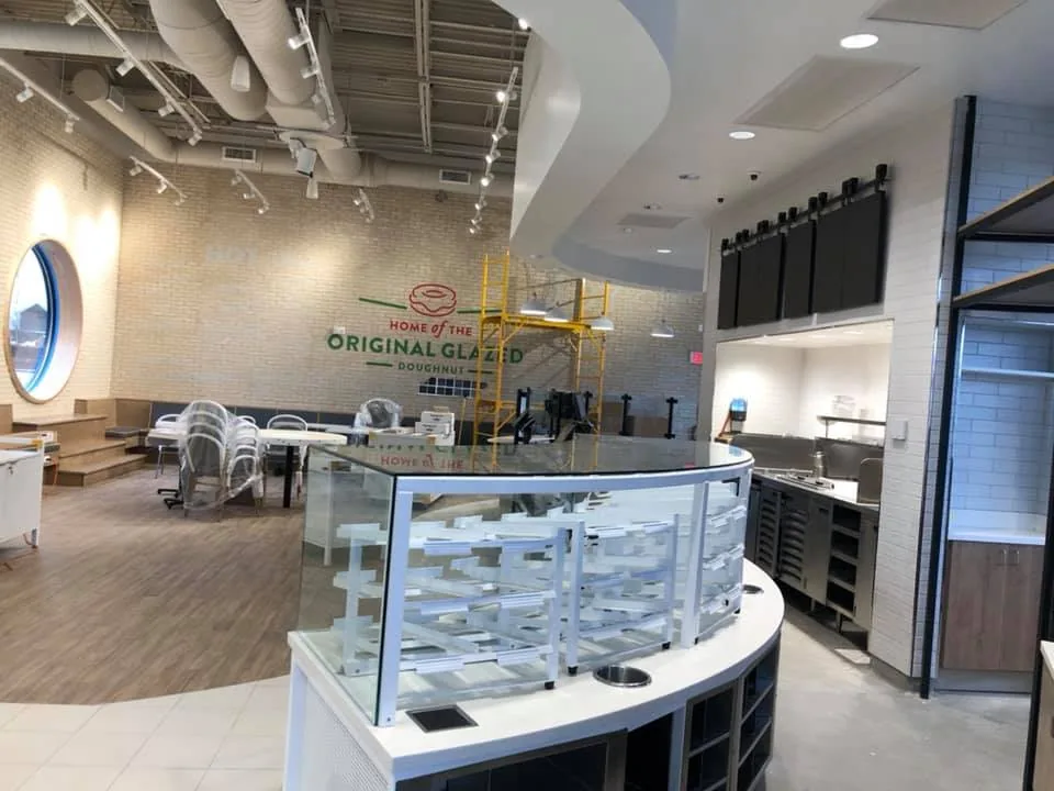 Retail space build-out with freshly painted walls and display fixtures